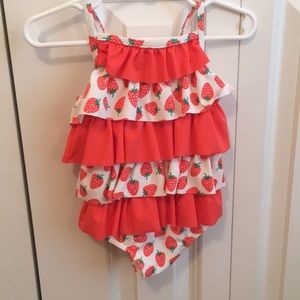 Mini Boden baby girl swimsuit.